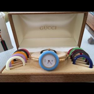 Gucci watch with 12 bezels. Original box/papers.